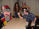 Bob B. challenges Chuck E<br>to an arm wrestle